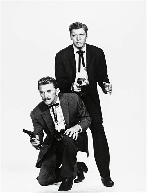 KIRK DOUGLAS and BURT LANCASTER in GUNFIGHT AT THE O. K. CORRAL -1957-. Photograph by Album ...