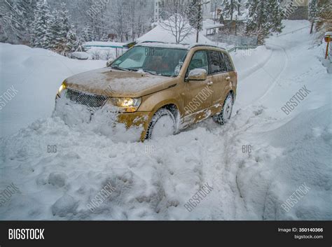 Car Rides On Snowy Image & Photo (Free Trial) | Bigstock