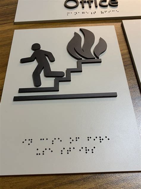 Enhancing Accessibility through Braille Signage