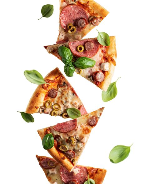 Premium Photo | Flying food Pizza slices with basil in levitation isolated on transparent background