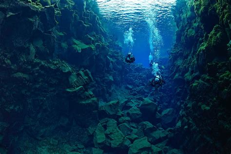 Diving Silfra under the Midnight Sun Day Tour - DIVE.IS - Iceland