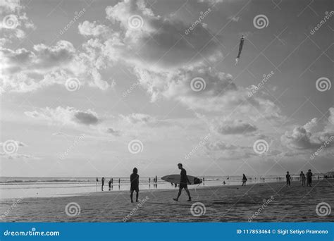 Walking with Hold Surferboard at Kuta Beach, Bali-Indonesia in the ...