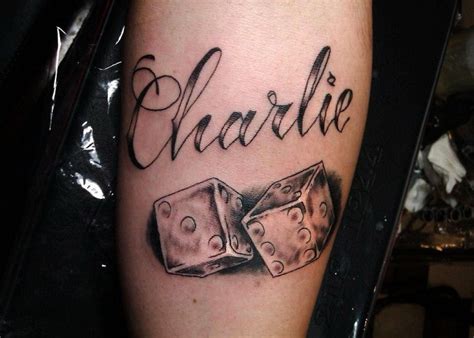 Charlie quote with dice tattoo on arm - Tattooimages.biz