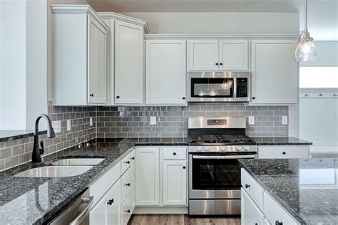 Dream Kitchen | Grey laminate flooring kitchen, Gray and white kitchen, White kitchen cabinets