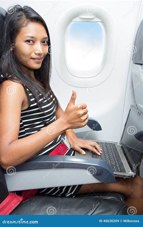 Woman with Notebook Sitting at Airplane Stock Image - Image of finger, inside: 40630209