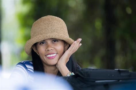 Premium Photo | Happy girl smiling with a hat