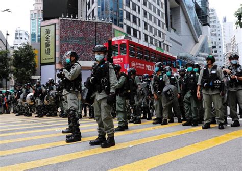 Riot police shield Hong Kong legislature as protests gather against ...