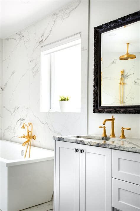 White Bathrooms with Gold Fixtures