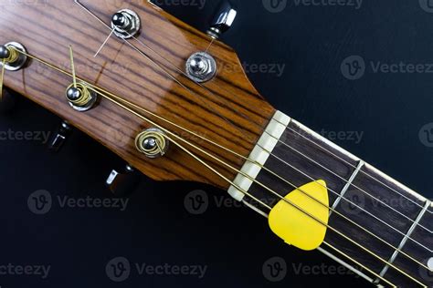 guitar and pick 13463591 Stock Photo at Vecteezy