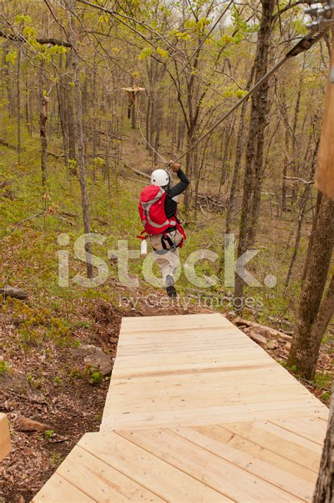 Girl Riding Zipline Stock Photo | Royalty-Free | FreeImages