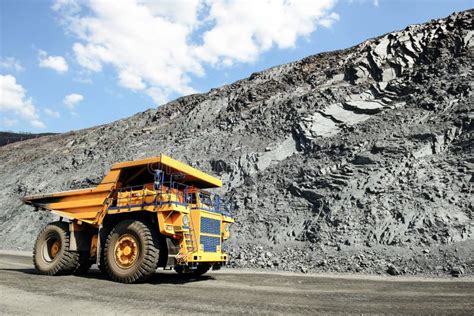 Iron ore mining stock photo. Image of machinery, mining - 164158846