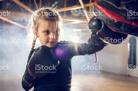 Little girl having a boxing training in a health club. | Boxing training, Sports training, Gym ...