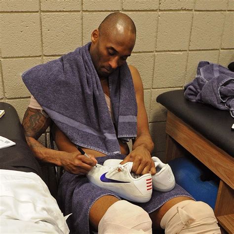 Hardwood Files on Instagram: “Be legendary. Kobe Bryant signing Devin Booker’s shoes after a ...