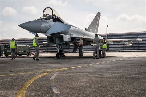 An RAF Typhoon being prepared for a sortie by ground crew from II (AC) Squadron from ...