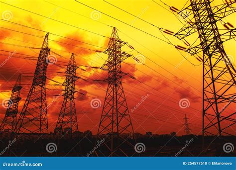 Silhouette of High-voltage Electrical Towers on a Sunset Background ...