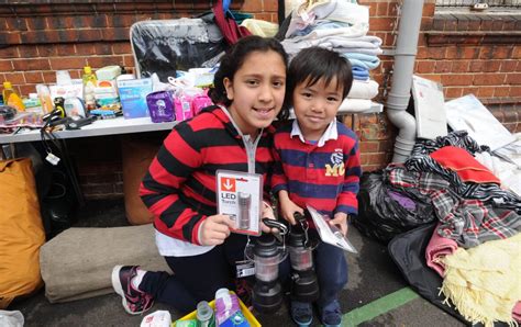 Children from Redlands Primary School with items for Nepal - Get Reading