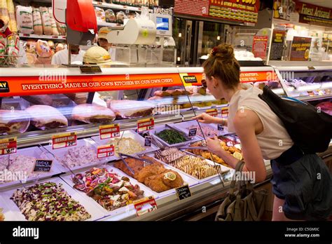 A shopper in the deli department in the Fairway supermarket on the ...