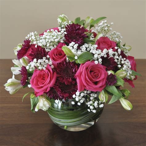 A pretty round arrangement to welcome a baby girl's arrival. | Fresh ...