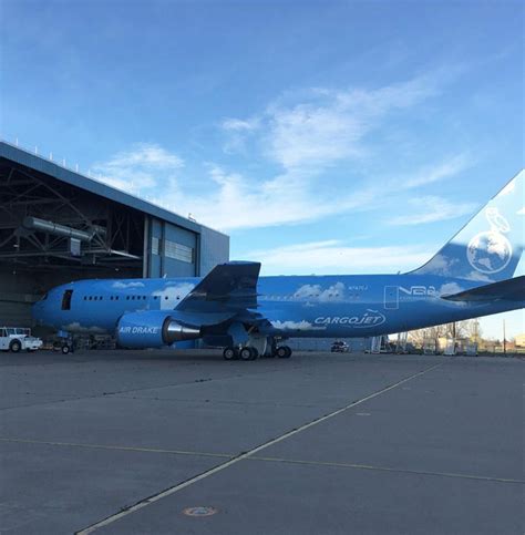 virgil abloh customizes drake's boeing private jet with white clouds