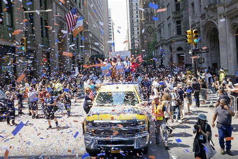 NYC honors essential workers at parade up Canyon of Heroes | AP News