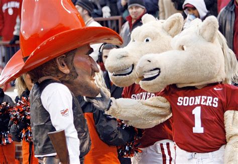 Oklahoma University Sooners. Boomer and Sooner picking a fight with the ...