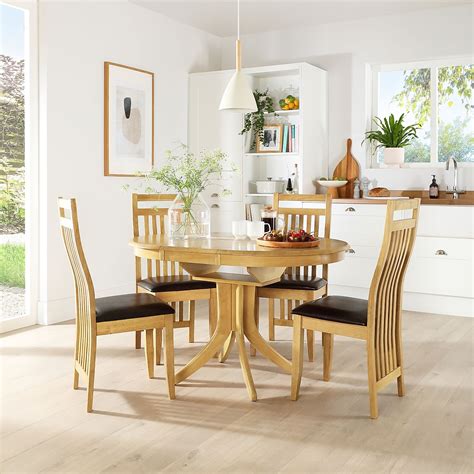 Round Extendable Dining Table & Chairs : Arles Round Extending Dining Table - Furniture Village ...