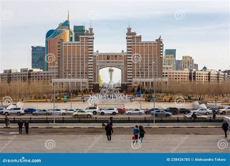 Landscape of Nur Sultan City with Monumental Gate with Skyscrapers, Bayterek Tower and Nur ...