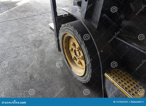 Wheels of the forklift stock image. Image of repair - 121547221