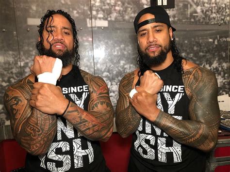 The #Usos show support for their cousin #RomanReigns. They look lay it ...