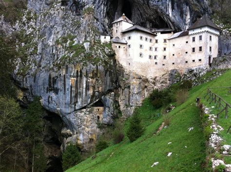 Predjama castle with cave by ahotko on DeviantArt