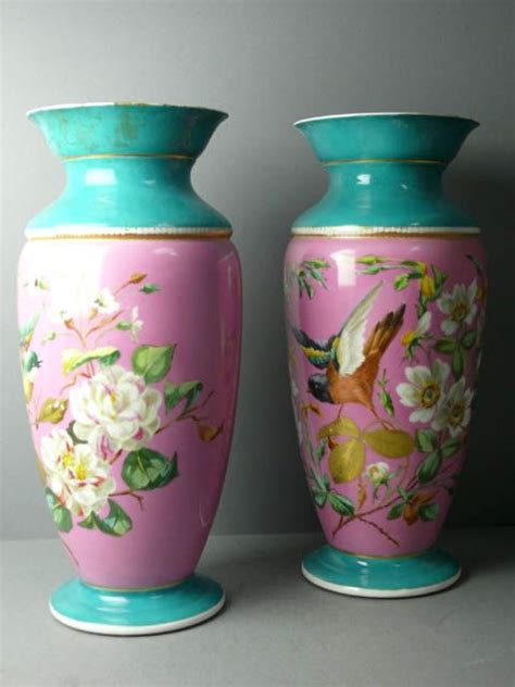 Beautiful Edwardian vase in turquoise and pink porcelain. Decorated with flowers and birds ...