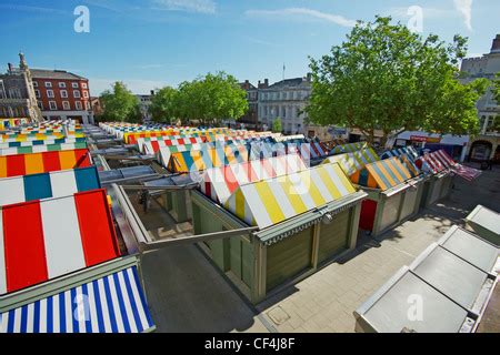 The brightly coloured canopies of stalls on Norwich Market Stock Photo ...