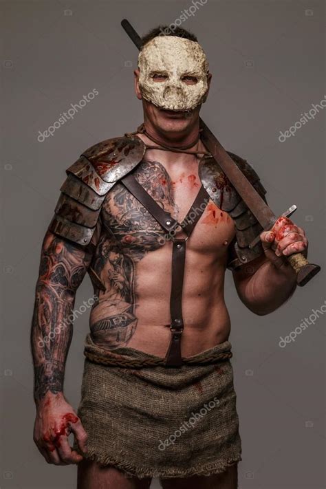 Gladiator mask tattoo | Muscular gladiator in skull mask — Stock Photo ...