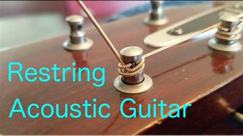 How To Restring An Acoustic Guitar Properly - YouTube