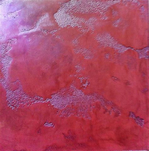 an abstract painting with red and purple colors