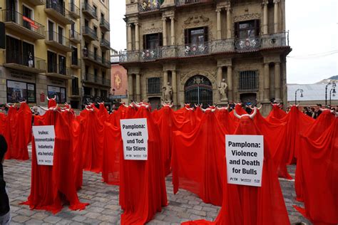 Nude Activists Create ‘Sea of Blood’ to Protest Pamplona’s Sadistic Bullfights