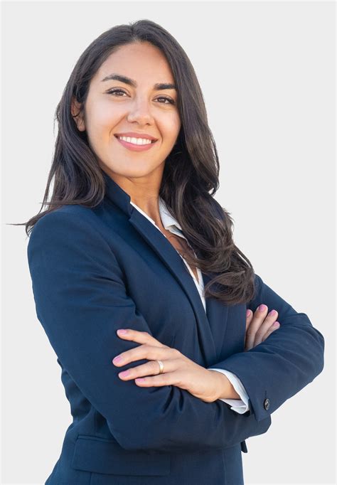 Smiling confident businesswoman posing with arms folded - Professional One