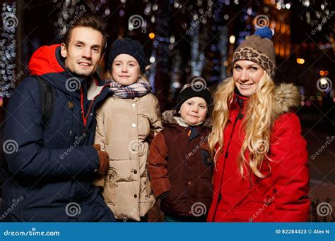 Smiling Family with Children Outdoors Stock Image - Image of night, celebration: 82284423