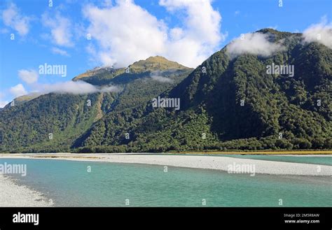 Haast River and mountains - New Zealand Stock Photo - Alamy