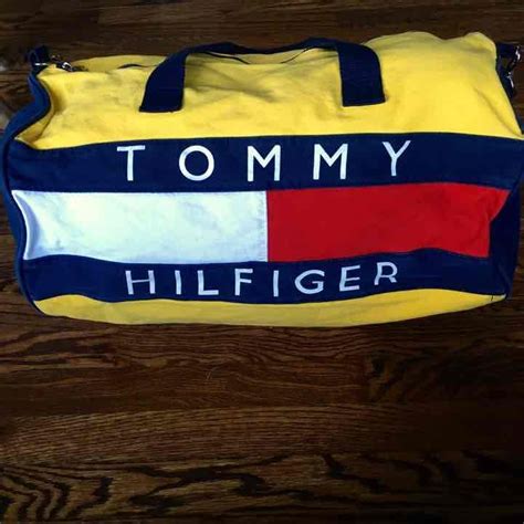 Vintage Tommy Hilfiger yellow duffle bag on Mercari | Tommy hilfiger ...