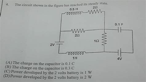 The circuit shown in the figure has reached its steady state. | Filo
