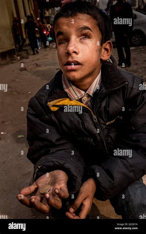 Homeless child begging hungry hi-res stock photography and images - Alamy