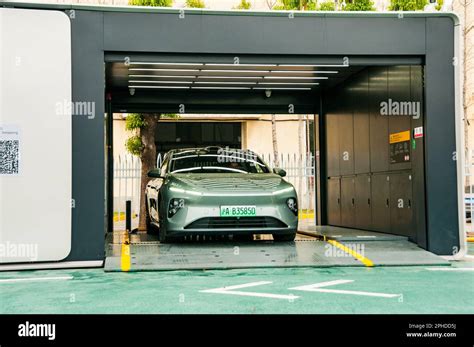 A Nio ET7 undergoing battery swapping with the Nio Power Swap Station 3.0 installed at the Nio ...