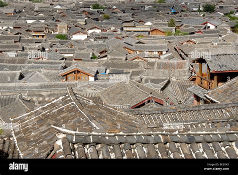 Tiled roofs, old town of Lijiang, UNESCO World Heritage Site, Yunnan Province, People's Republic ...