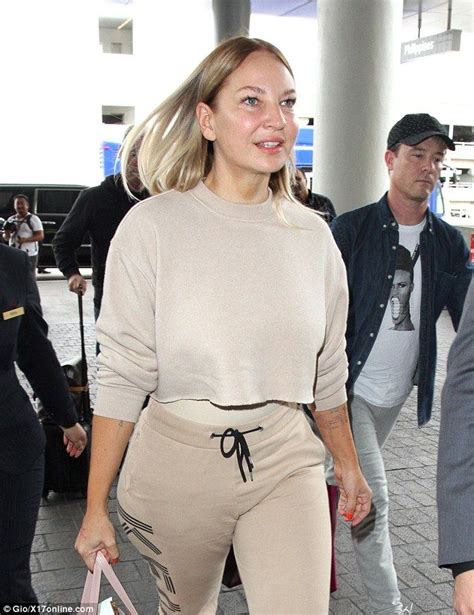 Sia Furler was spotted at Los Angeles Airport on Wednesday without her trademark black and white ...