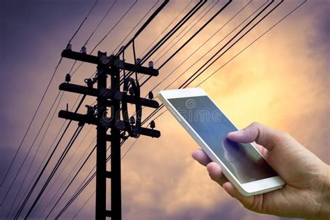 Hand Holding Smartphone on Silhouette Sunset Stock Image - Image of pylon, high: 80945335