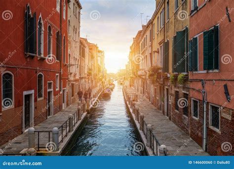 Street Canal in Venice, Italy. Narrow Canal among Old Colorful Brick Houses in Venice, Italy ...