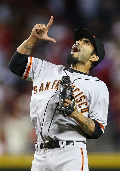 PHOENIX, AZ - MARCH 31: Relief pitcher Sergio Romo #54 of the San Francisco Giants celebrate ...