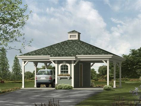 This striking carport boasts a stylish hip roof with louvered cupola ...