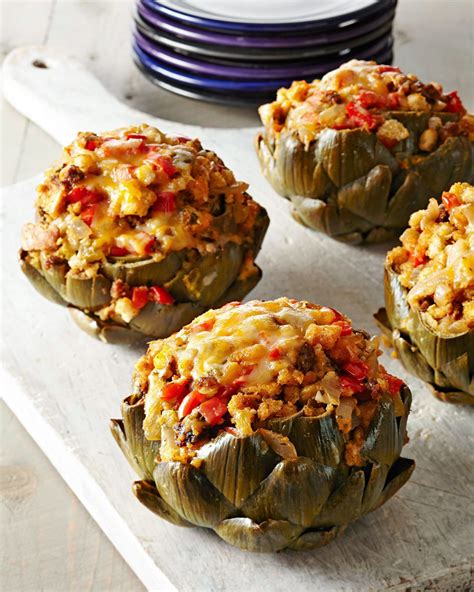 This stuffed artichoke recipe brings the heat with chorizo sausage and green chiles. Let these ...